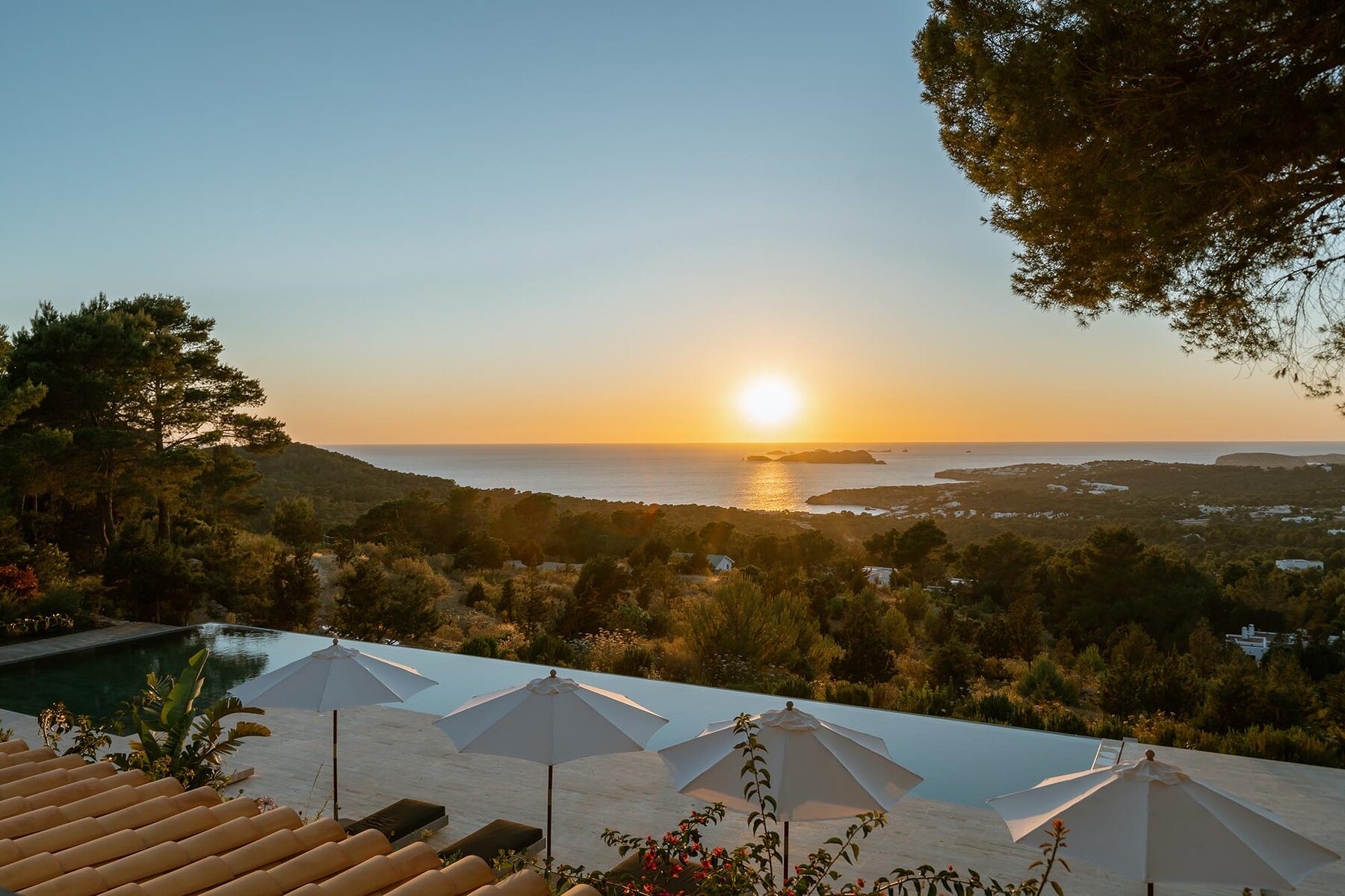 Private villa infinity pool at sunset, Ibiza