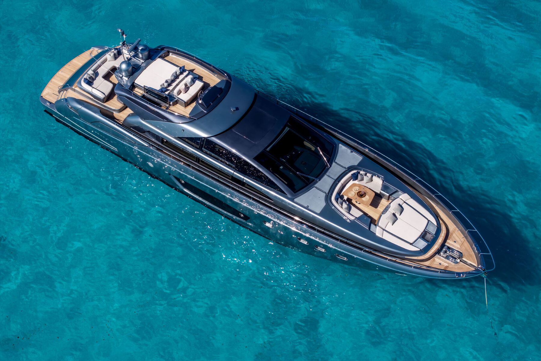 Riva 86 yacht seen from above in turquoise water
